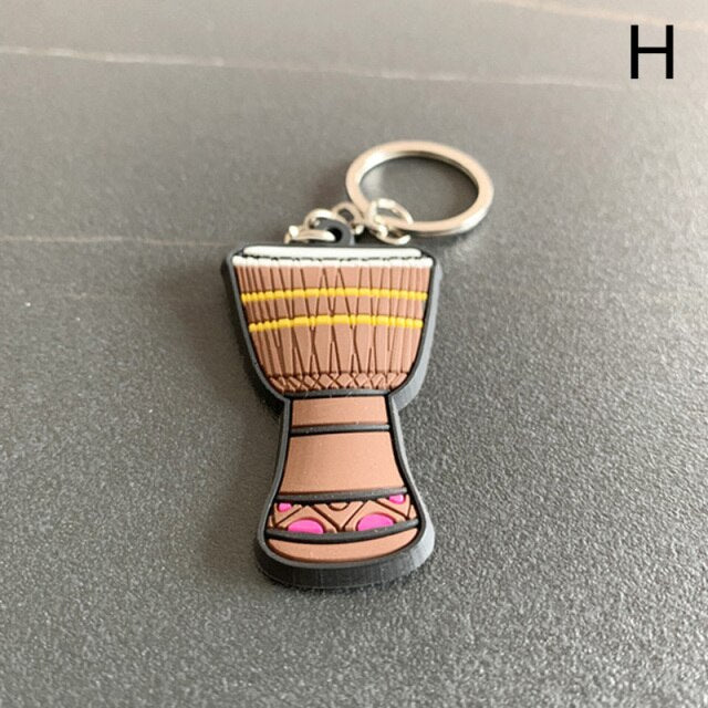 מחזיק מפתחות גיטרה כינור וסקסופון azamra
